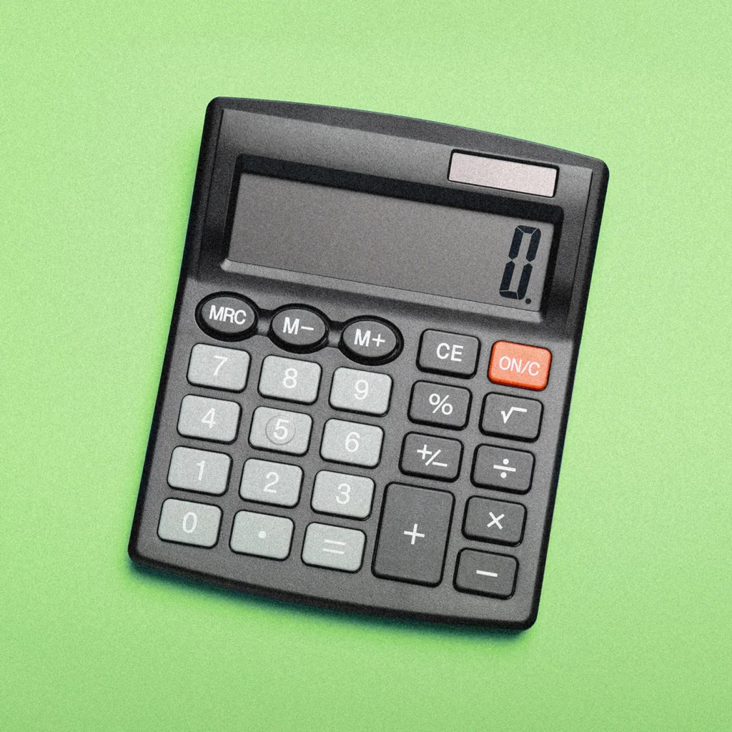 Calculator showing 0 on a green background.