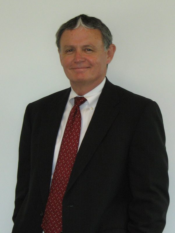 Bill Butler portrait in a suit.