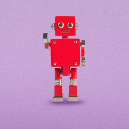Red robot on purple background.